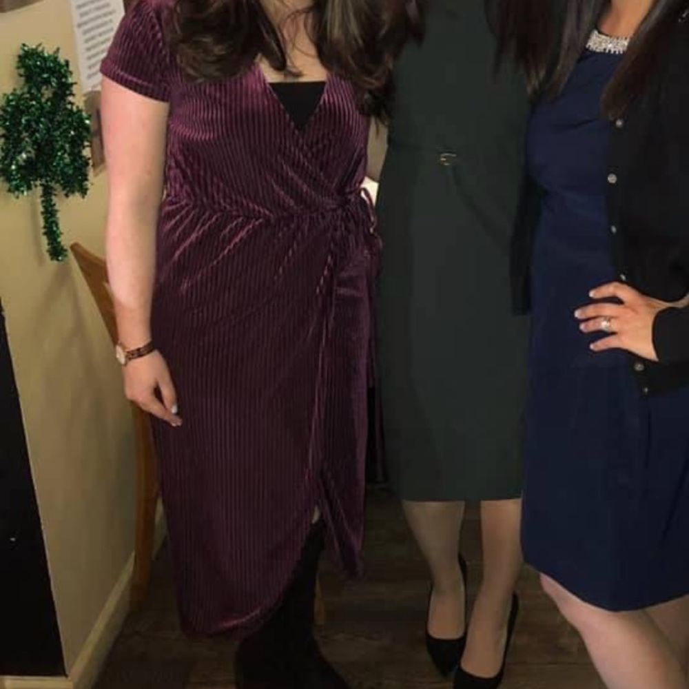 Selling the dress on the left (purple velvet)